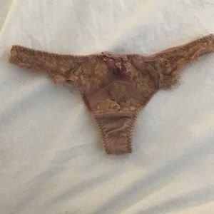 Agent provocateur thong and suspenders set